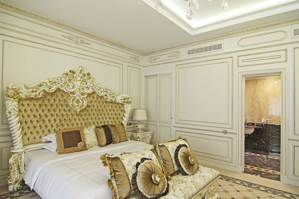 Orion Hotel Bishkek Exterior foto A bedroom in the hotel